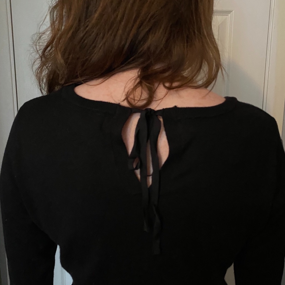 Flowy black peplum sweater